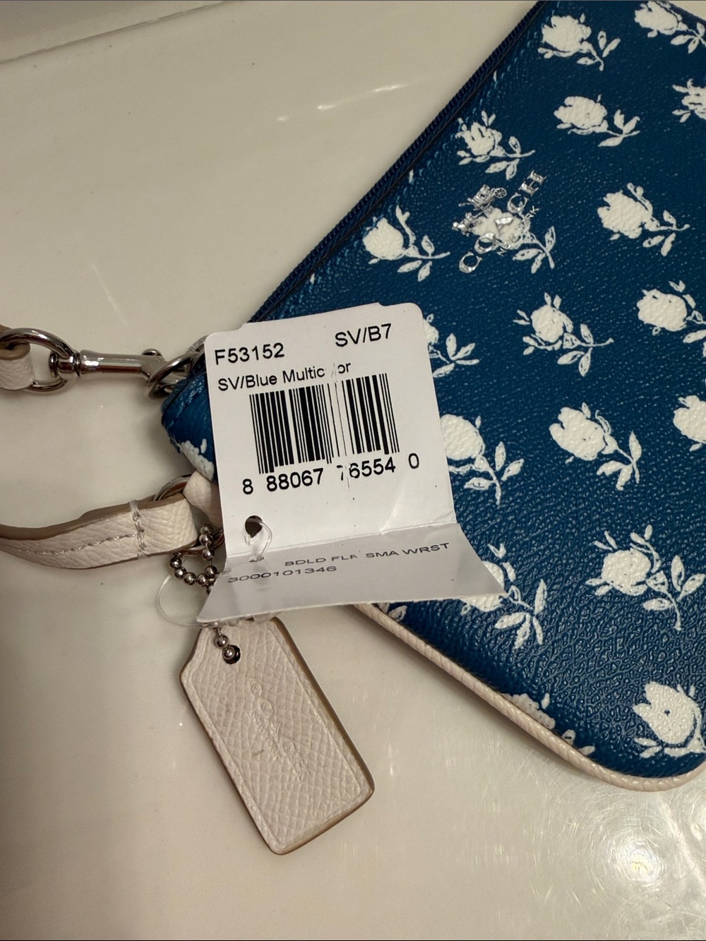 Coach Navy Floral Print Wristlet with Cream Strap - Picture 6 of 6